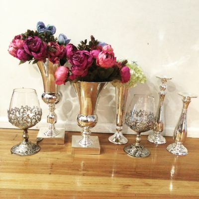 Silver vases, urns and candle holders