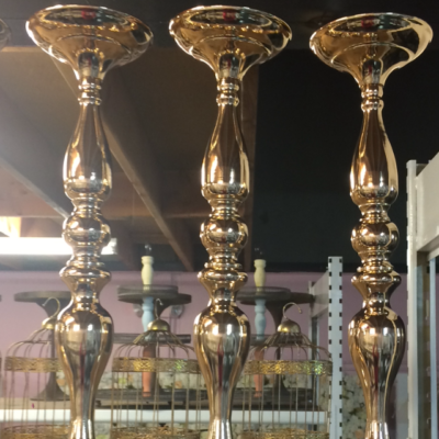 Tall gold candle holder