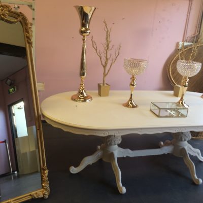 Freestanding gold mirror