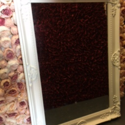 Large white ornate mirror