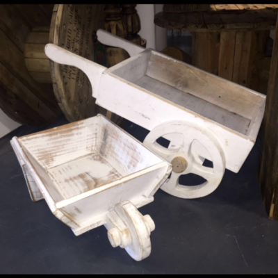 Small rustic white wheelbarrow