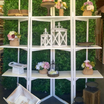 White trifold shelf stand