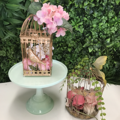Gold birdcage with flowers