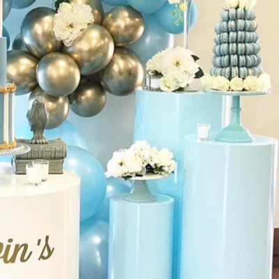 Set of three blue round acrylic plinths