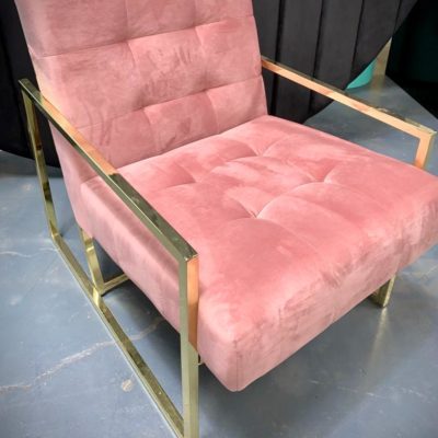 Pink and gold velvet armchair