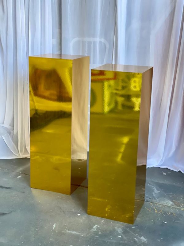 Square gold plinth