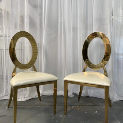Gold lux and white leather chairs