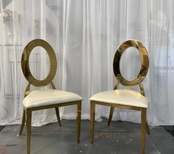 Gold lux and white leather chairs