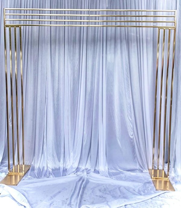 Wide gold lux arch backdrop