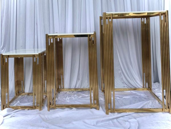 Gold and white square gold geo cake tables