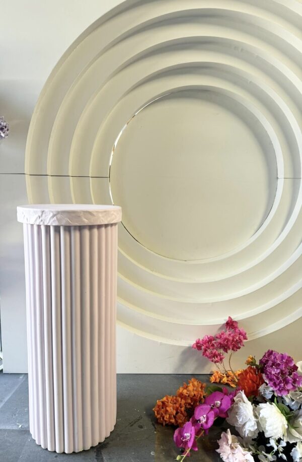 Pink ribbed plinth