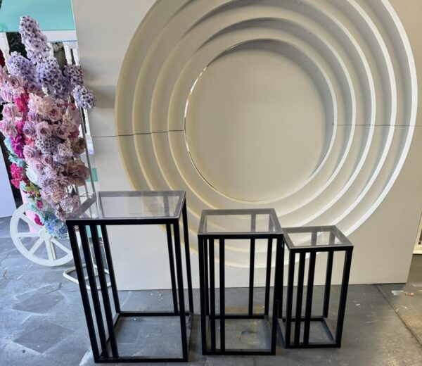 S/O three black and acrylic square pedestals